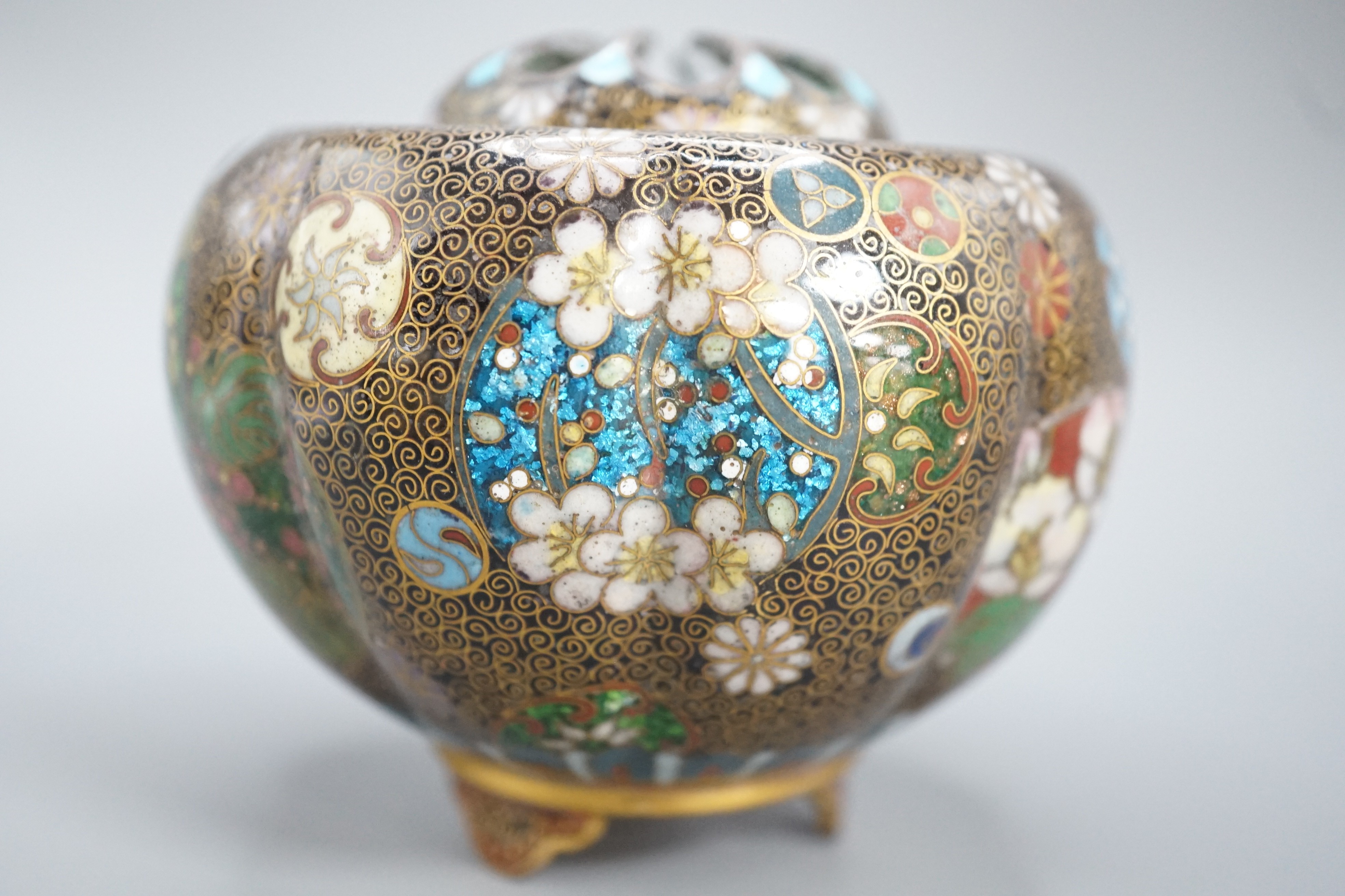 A Japanese cloisonne enamel koro and cover, 9.5 cm diameter and various Japanese mixed metal small boxes and covers, One made from Japanese sword fittings, signed, 4 cm